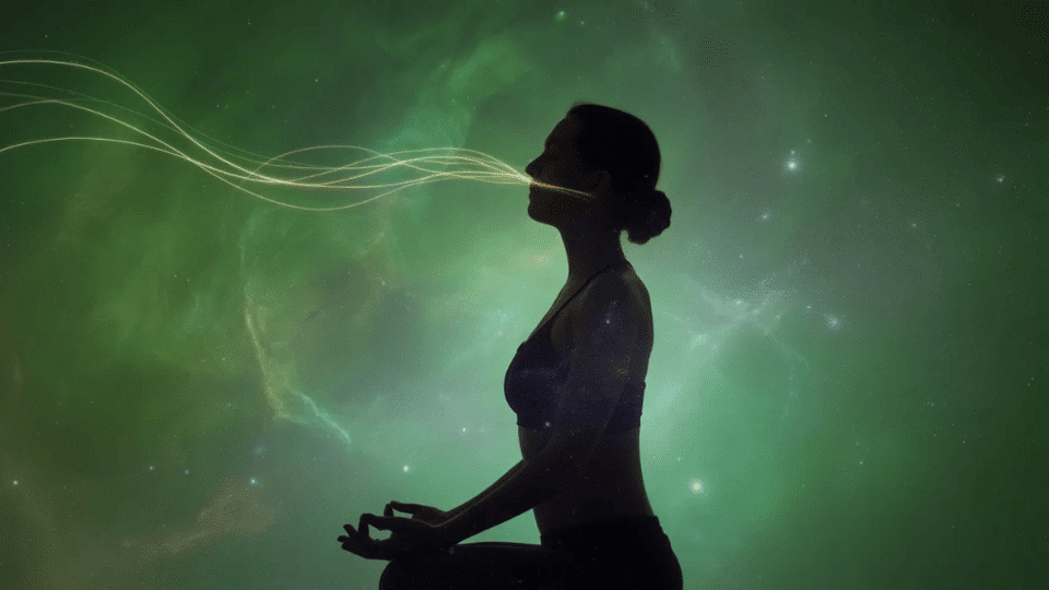 a person meditating with a clear visual flow of them engaging in pranayama and breathing the energy