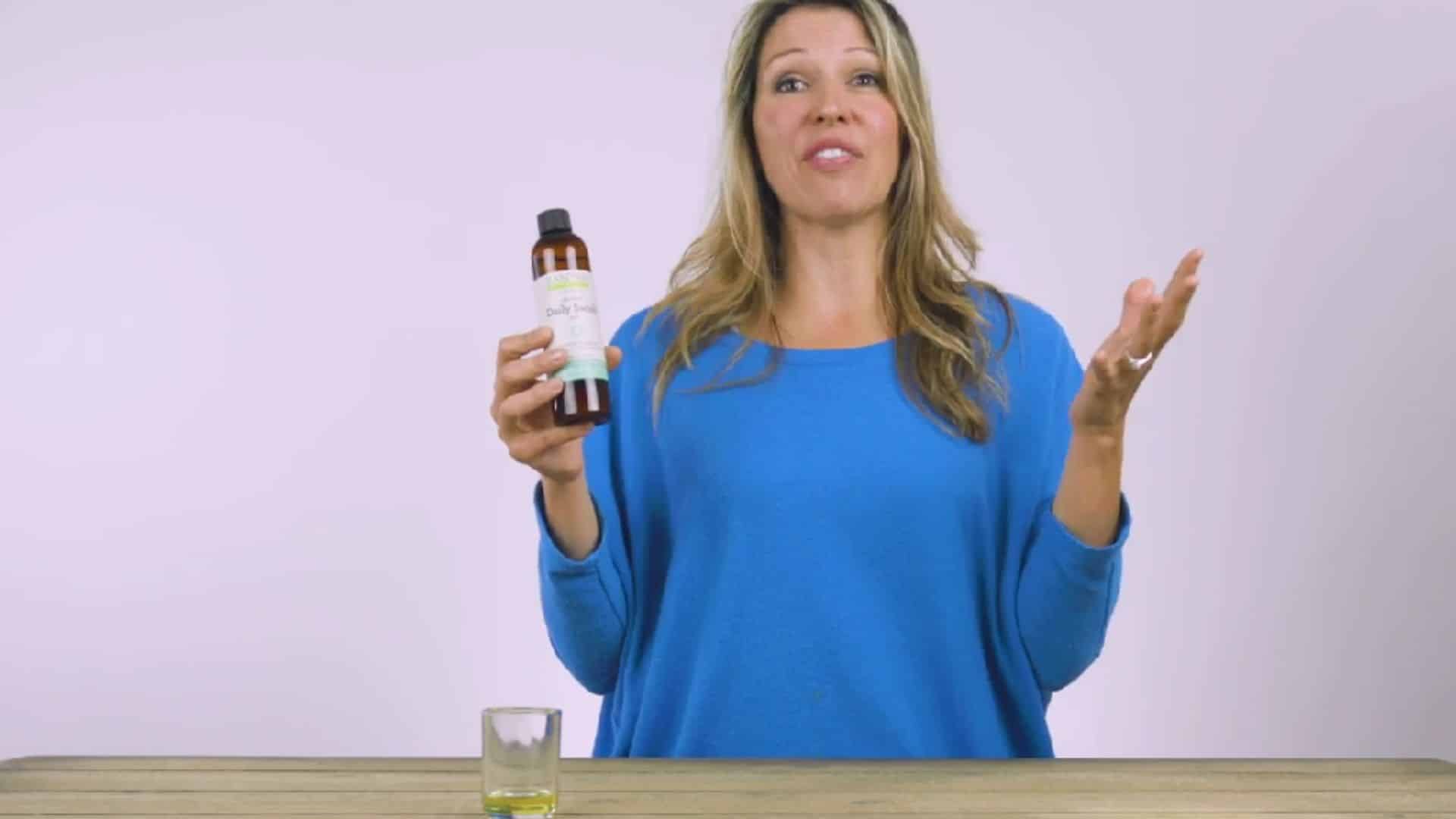 _a person practicing morning oil pulling before breakfast as part of a daily oral care and hygiene routine