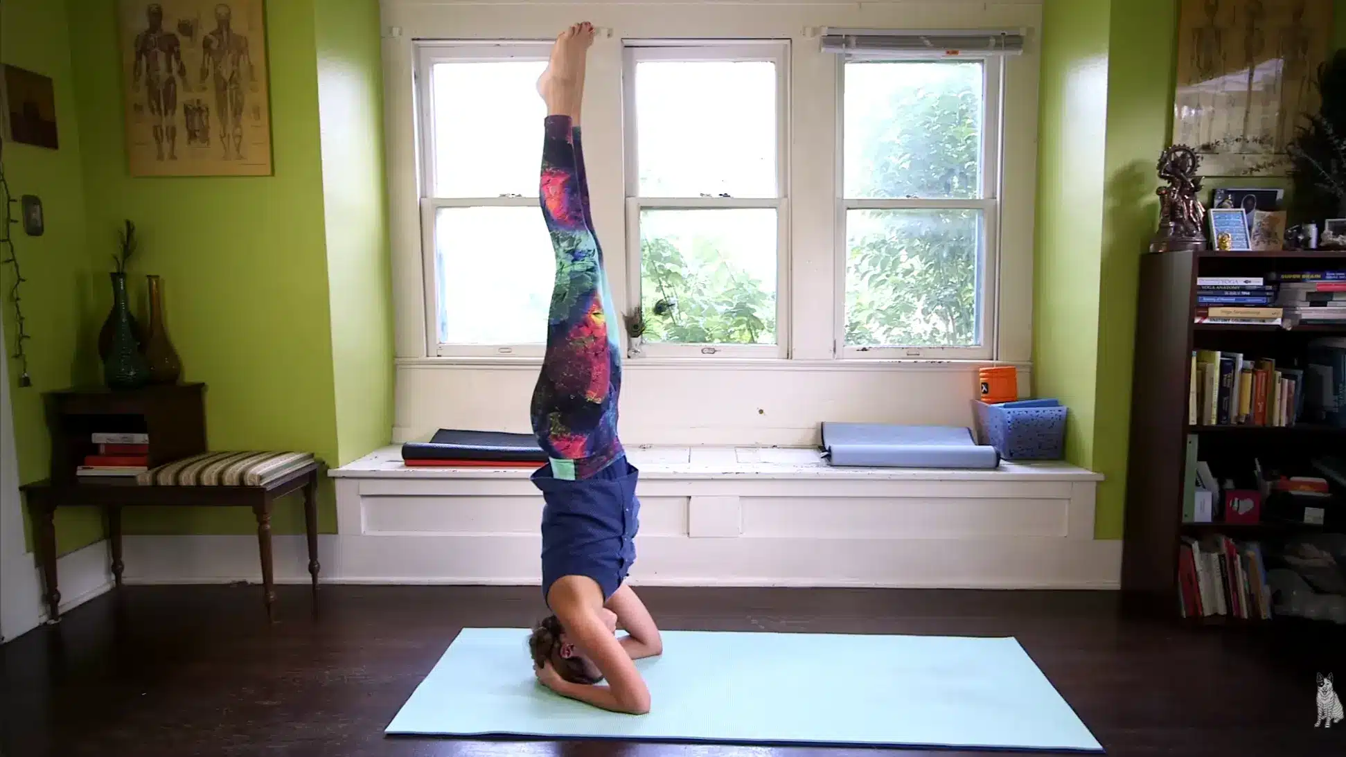 controlled leg lift into yoga headstand