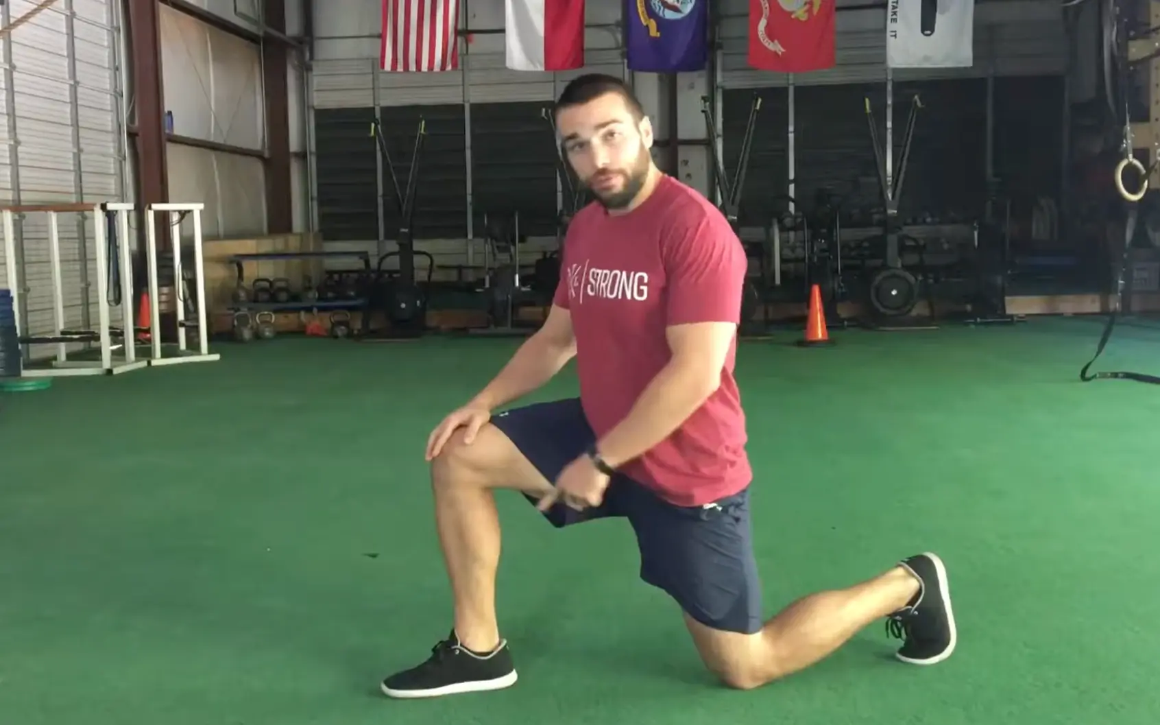 position Side view of the starting setup with one foot forward and the back knee down.