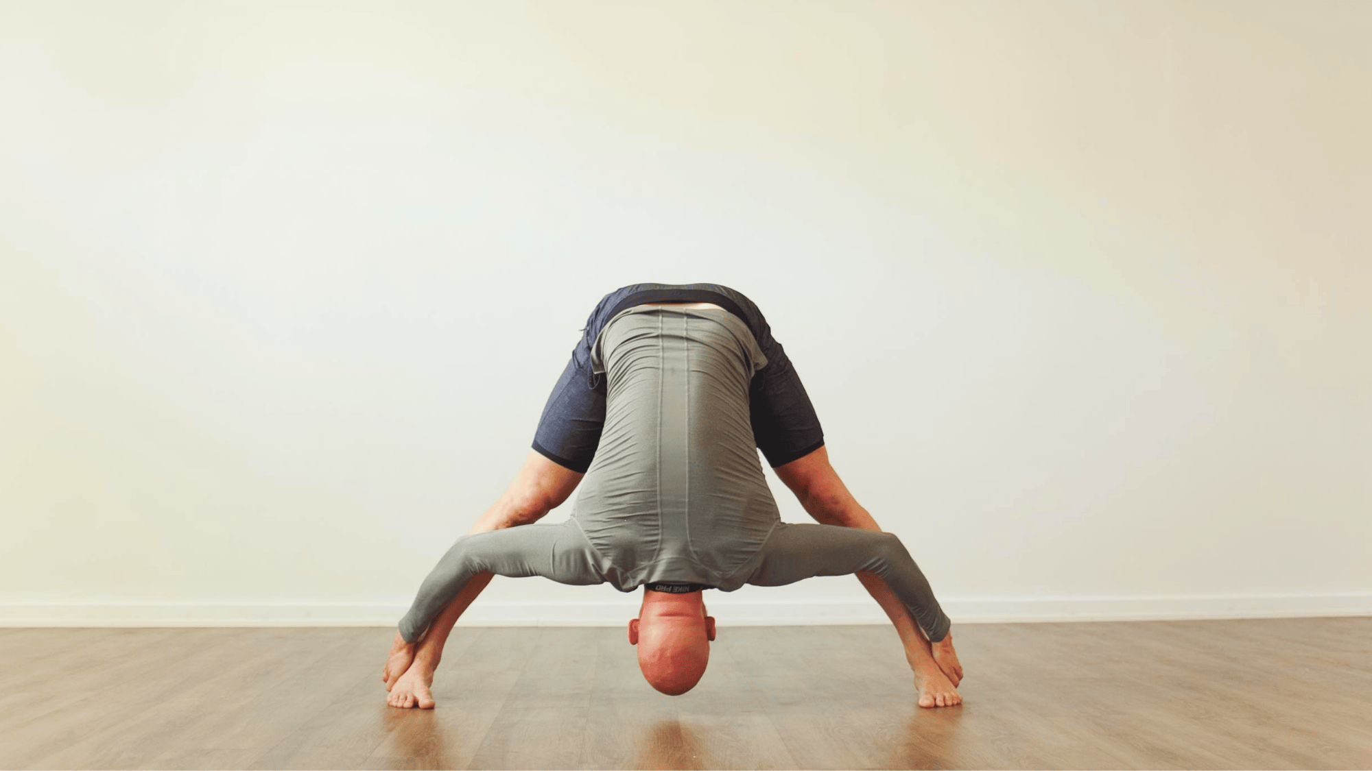 8 standing separate leg stretching pose dandayamana bibhaktapada paschimottanasana