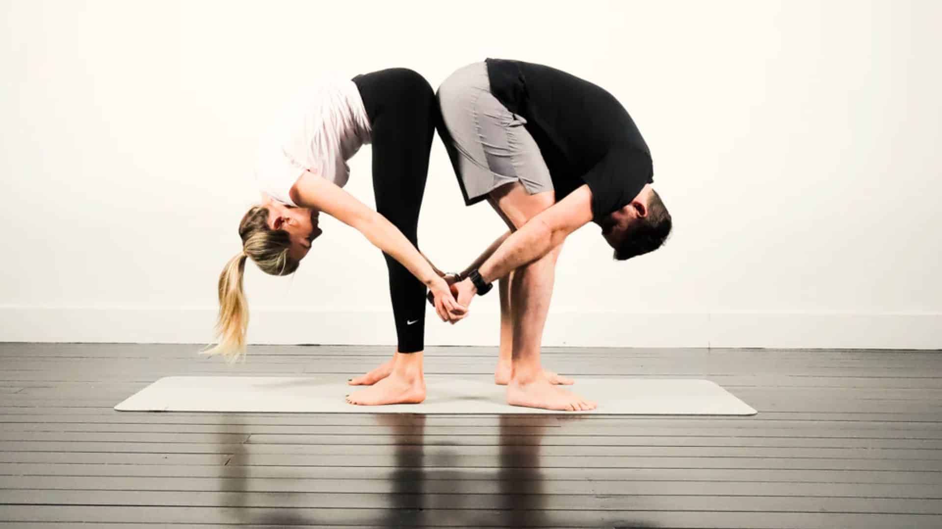 facing forward fold with partner