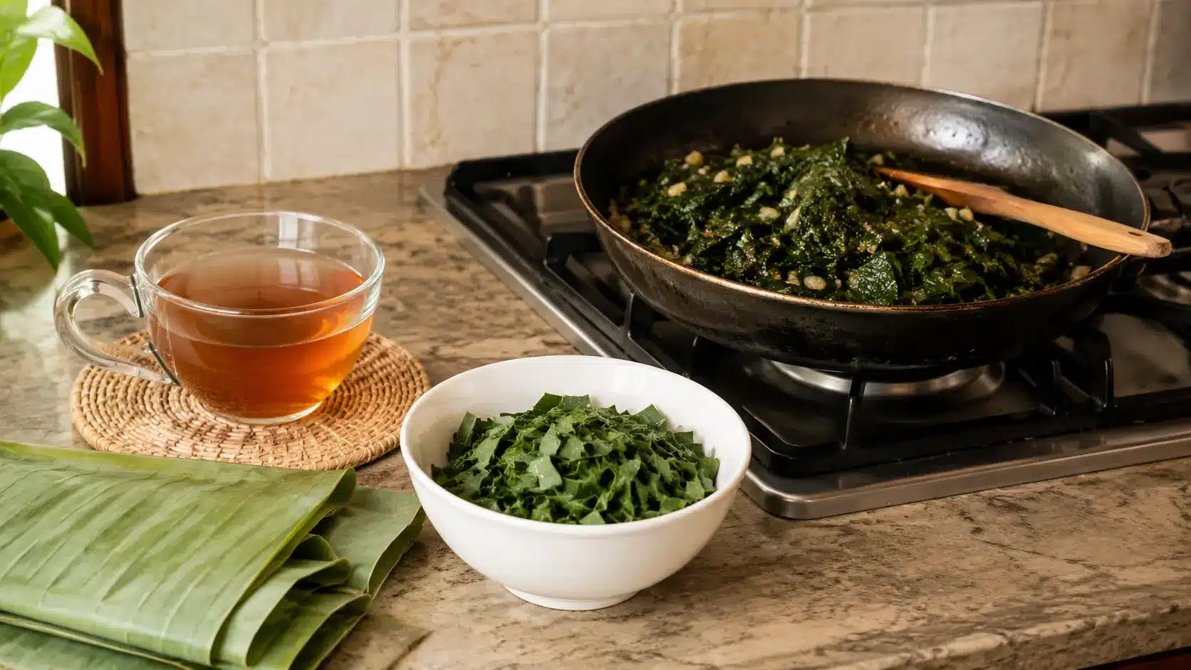 a cup of tea, sautéed young leaves in a pan, and a small bowl of chopped leaves ready for soup