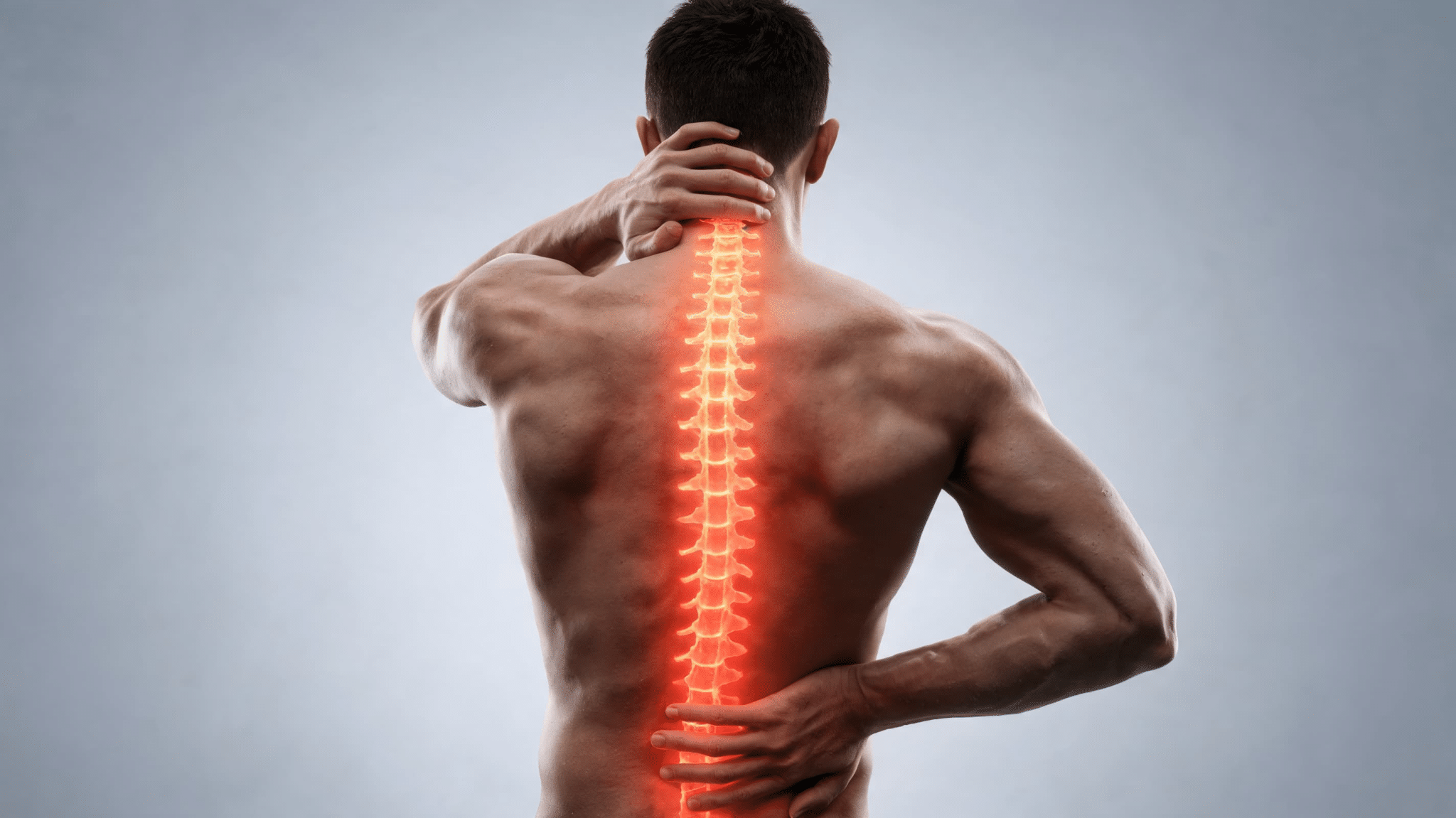 A person is shown from behind, holding their neck and lower back. A glowing red spine highlights pain or discomfort
