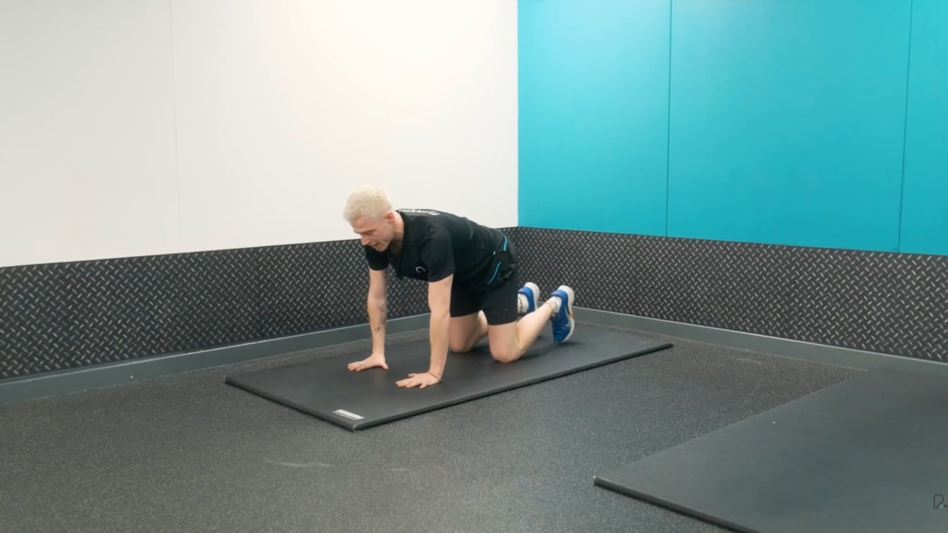 instructor begins moving the hands forward from tabletop