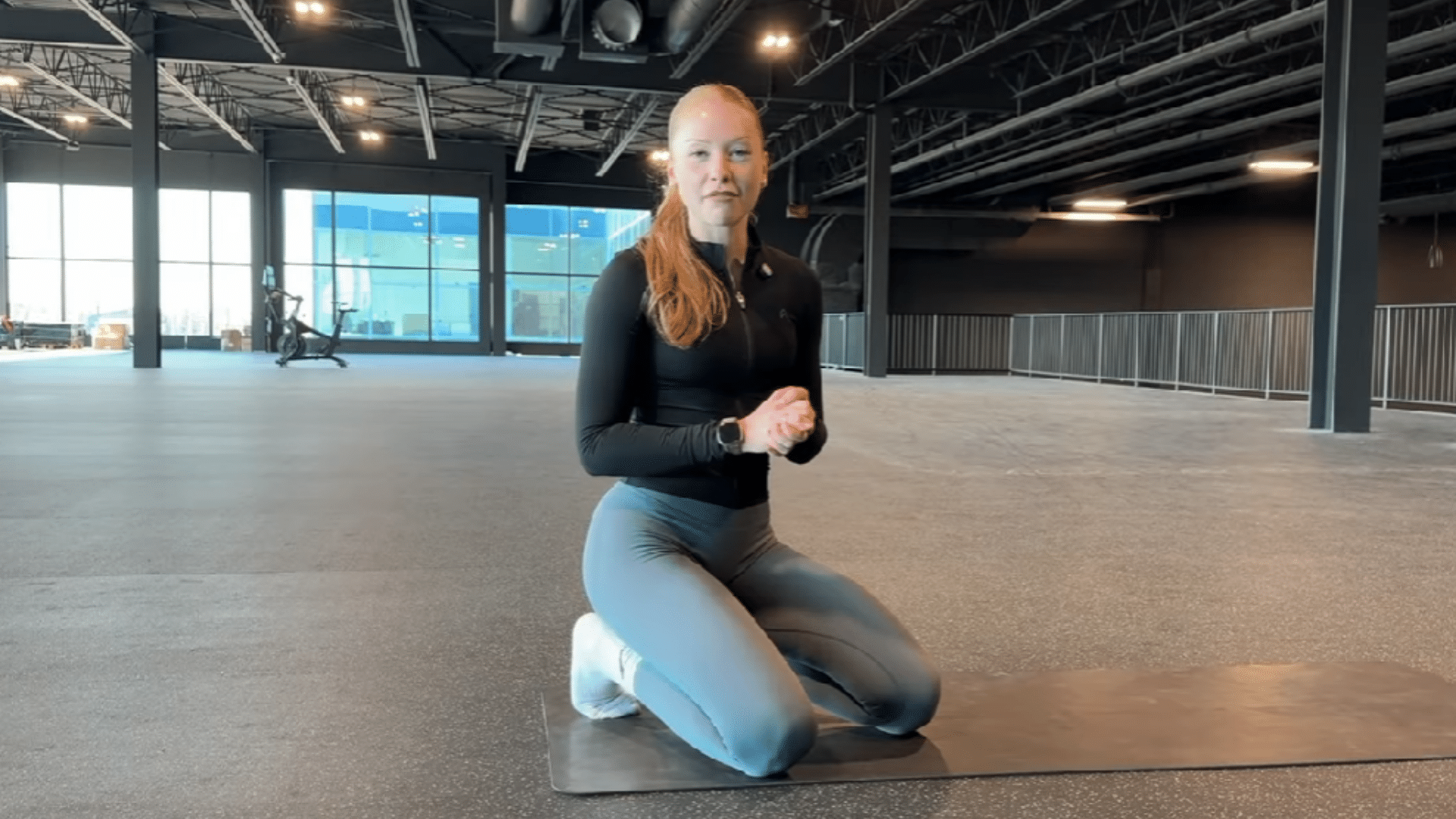 Person practicing donkey kicks to improve everyday strength and balance